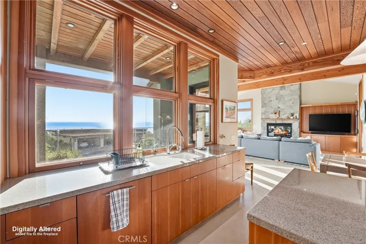 Kitchen flows seamlessly into Living Room. Great gathering space!