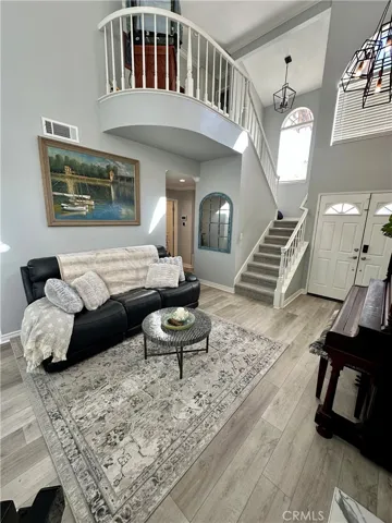 Dramatic staircase and soaring ceilings!