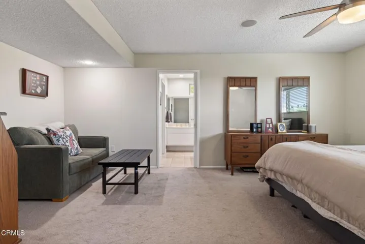 Primary bed and bathroom