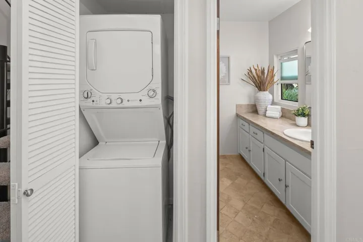 stackable closer next to guest bath on main floor.