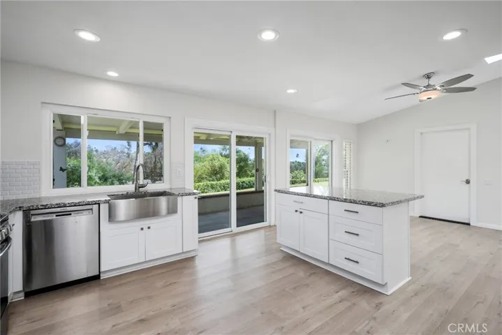 Stainless steel appliances complement the modern design.