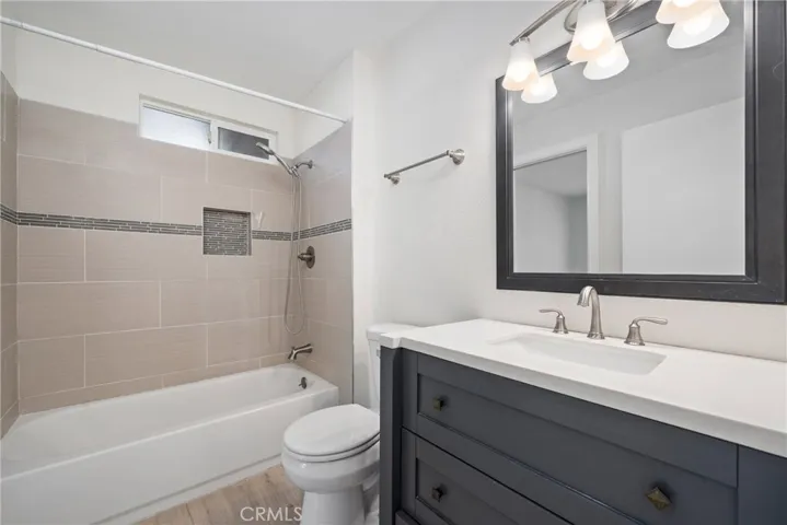 A full tub/shower combo makes this space ideal for guests or family.