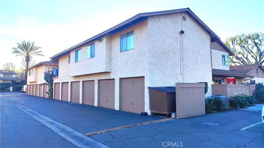 View of the building and assigned parking space spot # 160 next to the unit for convenience