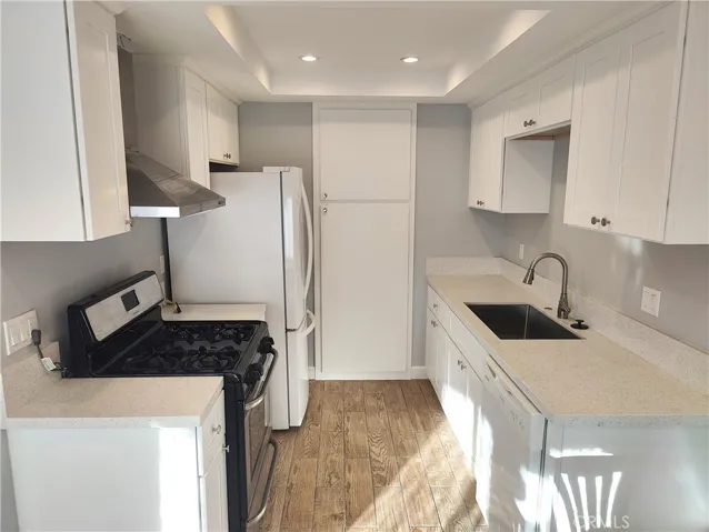 Good Size remodeled kitchen with new cabinets, sink, faucet, paint