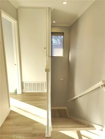 Upstairs with windows for light to come in