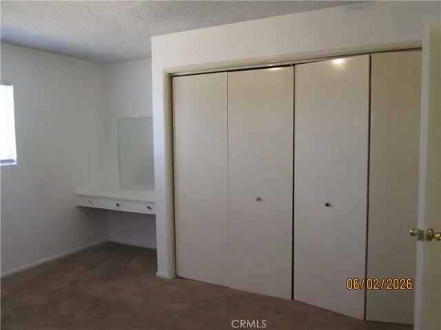 PRIMARY BEDROOM CLOSET
