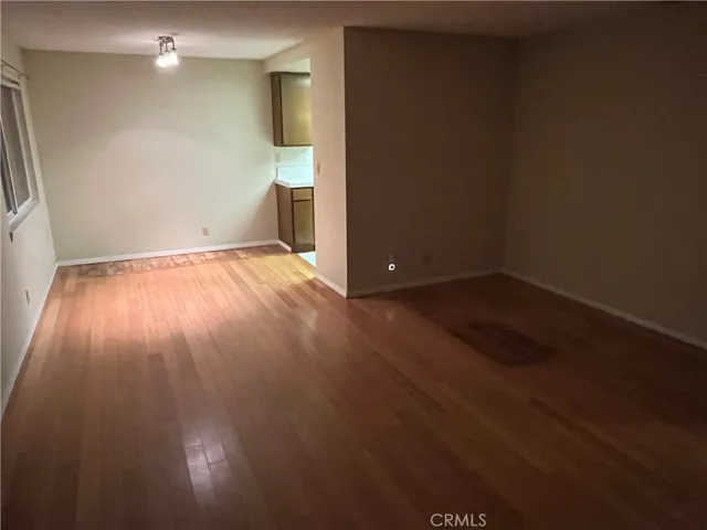 Unit B 1/1 living room dining room hdwd floor