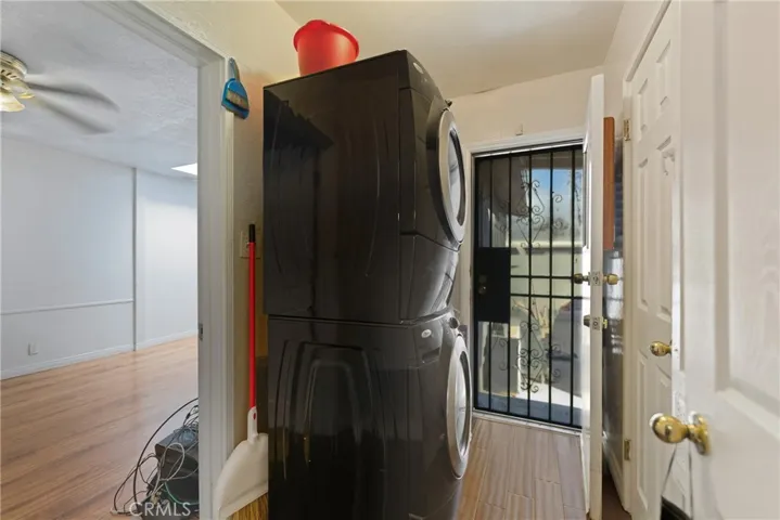 Laundry room / 1/2 bath room is across from the washer and dryer