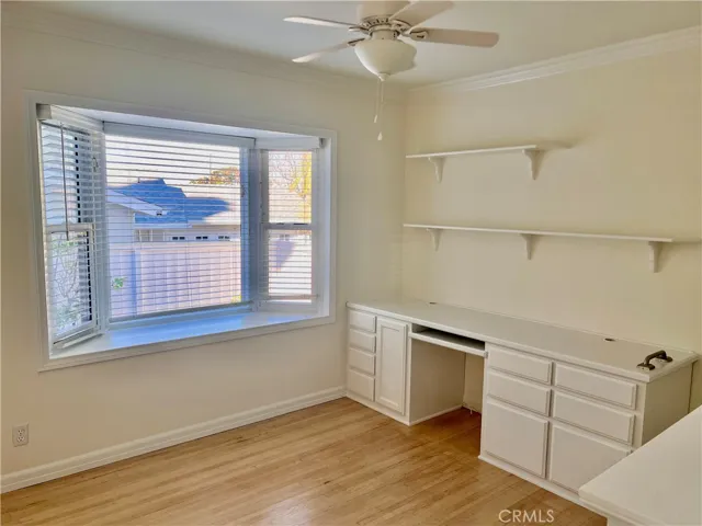 Office Offers Built-in Shelving and Desk, Bay Window, Ceiling Fan