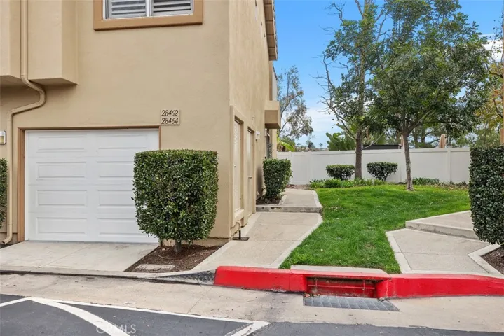 Charming carriage style home with direct garage access!  parking is plentiful in the well-designed community!