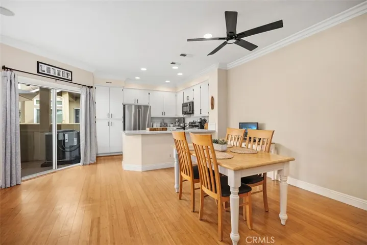 The newer cooling ceiling fan and doors to the outdoor balcony!