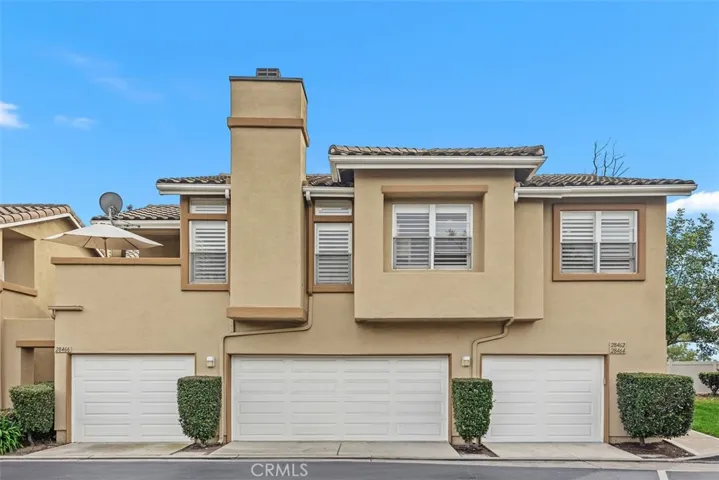 Exterior view of the carriage-style unit feauting a convenient attached garage,