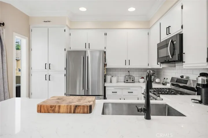 Upgraded kitchen with fabulous farmhouse sink.