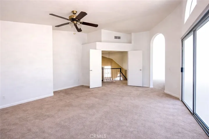 Upstairs Primary Bedroom. Photos have been digitally enhanced,