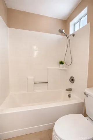 Upstairs shared bathroom for additional 3 bedrooms. Photos have been digitally enhanced,