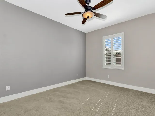 This room is currently being shown as an extra living space but is primarily a bedroom.