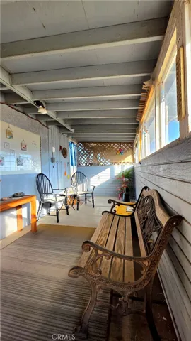 Rear enclosed patio off master bedroom