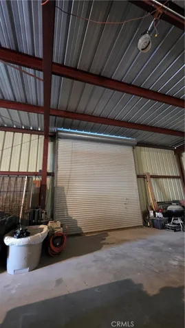 Chain drive roll up door