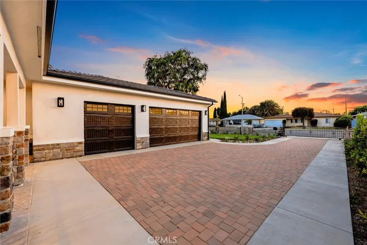 View of the three-car garage & driveway