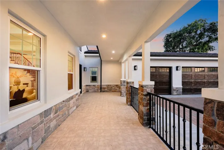 A charming covered front patio