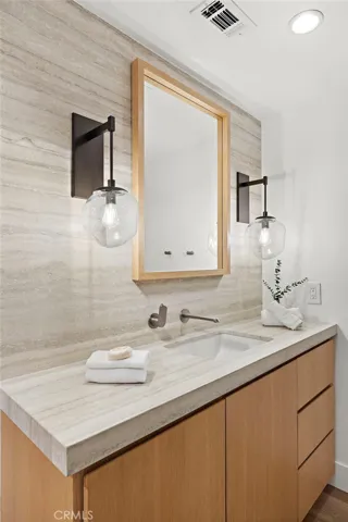 Photo digitally altered. Left bulb cover is missing.