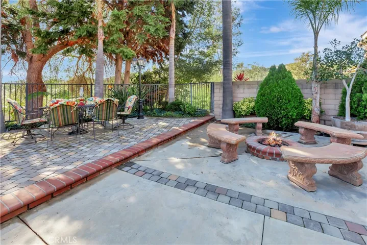 Gather around the fire pit w/friends & family for warm cozy conversation.