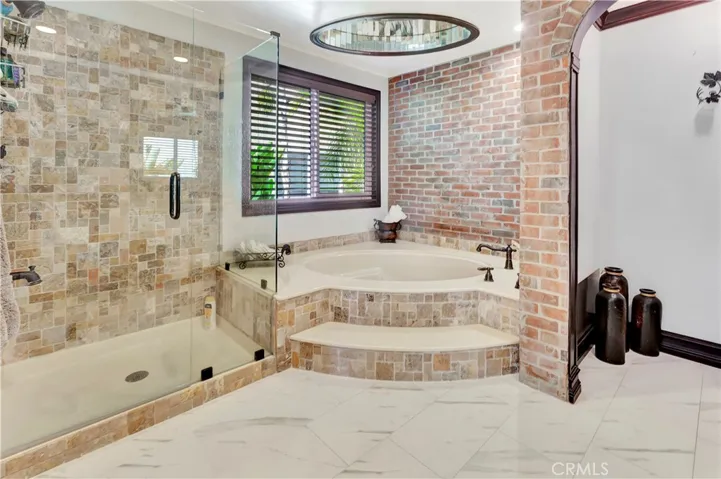 Soak in this inviting,large tub for a refreshing experience.