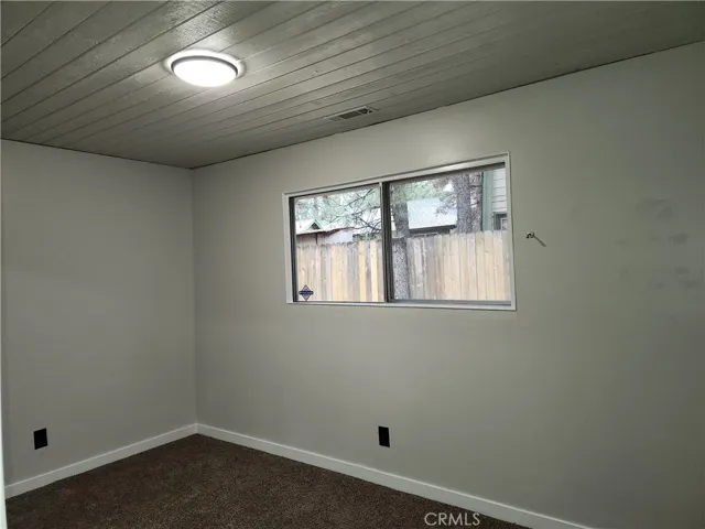 Bedroom 2 has mirrored closet doors, new carpet & paint