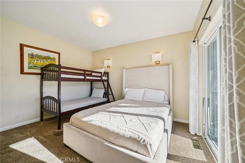Flexible layout accommodating multiple beds with great natural light.