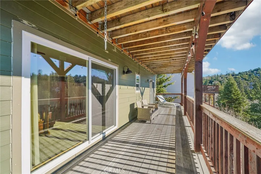 Shaded retreat off the bedroom level—perfect for morning coffee.