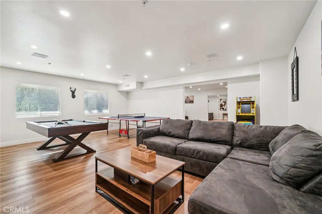 Bright media hangout with recessed lighting and space to spread out.