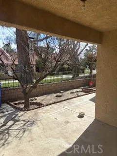 rear yard, fenced with gate to exit to walking path