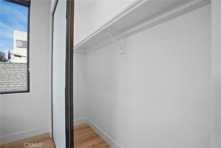 Generous closet space with frosted glass