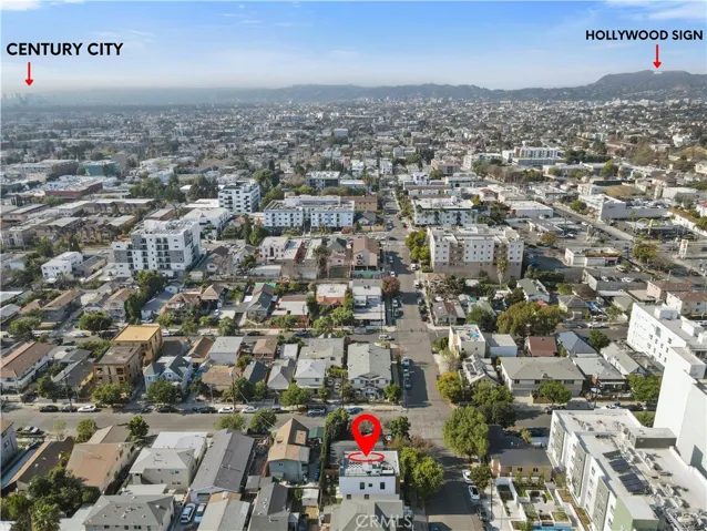 New construction home with views of Century City and the Hollywood sign from the roof deck
