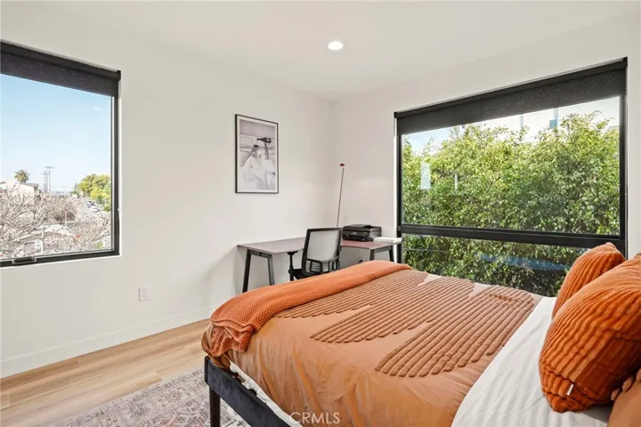 Third bedroom with large picture windows