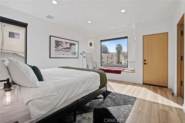 Primary suite with long built-in window bench