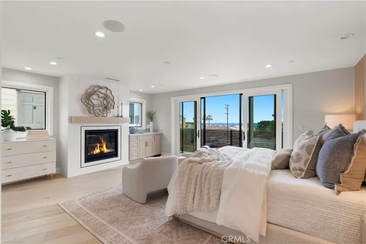 Primary Bedroom Suite with Fireplace and Ocean View Deck