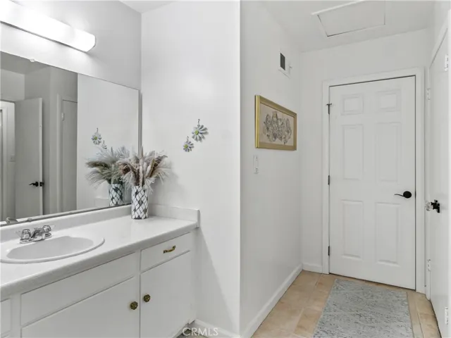 Primary bathroom is very open!  Lots of space & plenty of storage