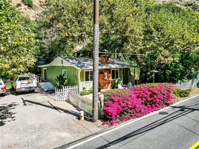 Front of home & adjoining lot.  So rare to have a beautiful home AND plenty of parking in Silverado Canyon!