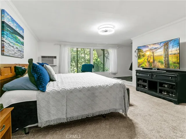 Spacious, bright primary bedroom with plenty of space & spectacular view to the creek.  Imagine waking up every morning like you are in an air bnb!?