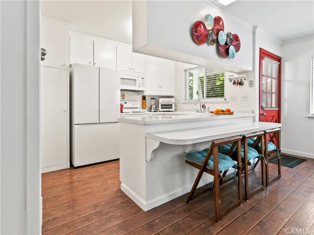 Bright, open kitchen with plenty of space & functionality.