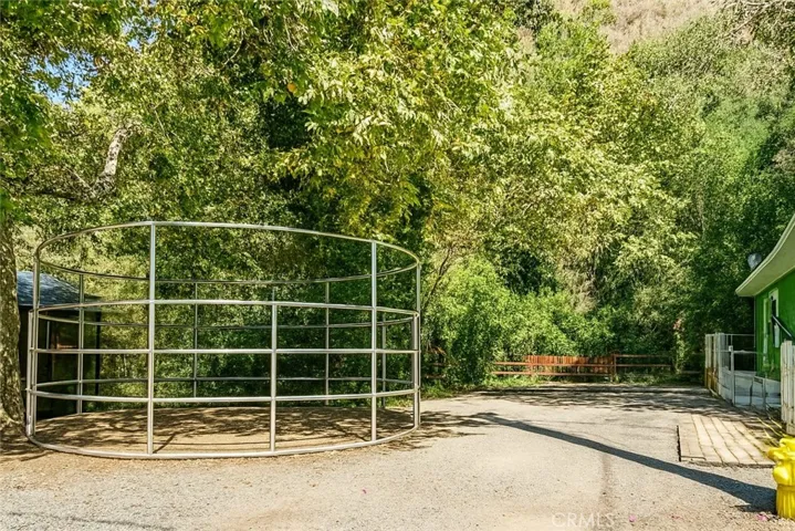 Adjacent lot to home (AI enhanced photo with possibility of livestock corral)