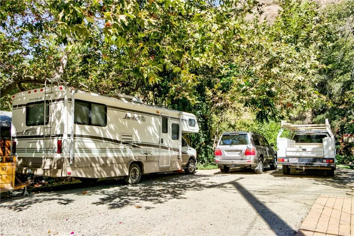 So much space! On the other side of RV is an 8x30 storage shed & more available parking!