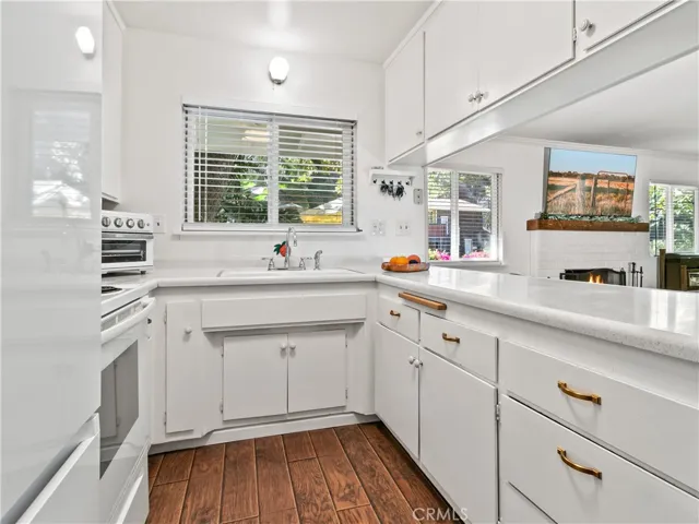 Kitchen is so open!  Love the widow looking onto the hillside.