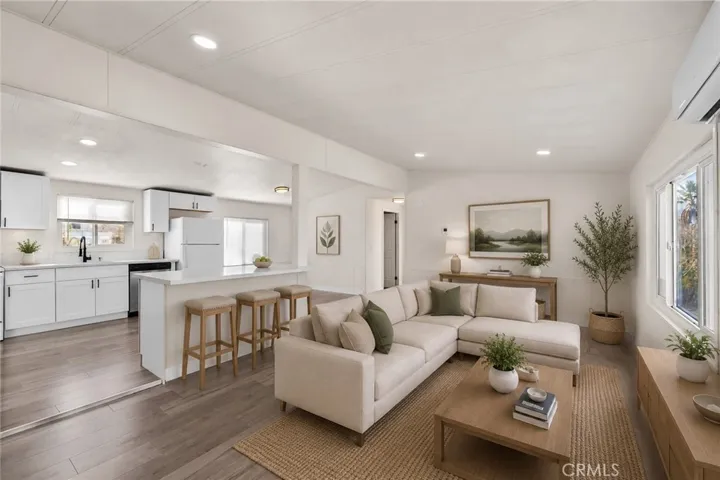 This photo is virtually staged. Furnishings and decor are digitally added and not included in the sale.