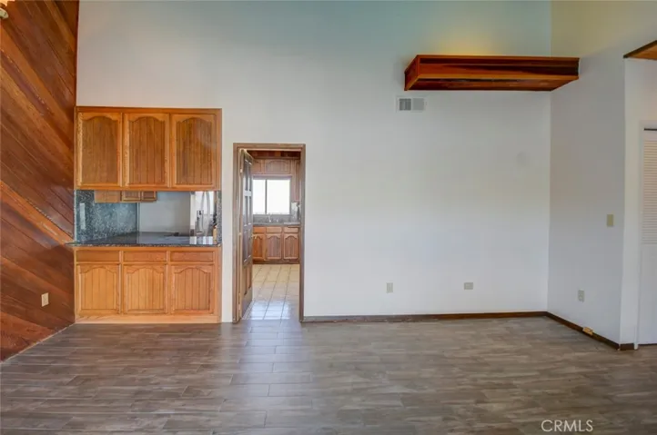 A look at the large family room towards the kitchen.