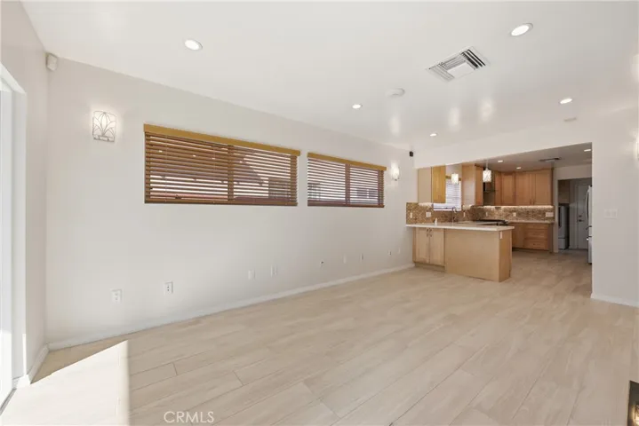 Family room with Lutron Serena Smart blinds