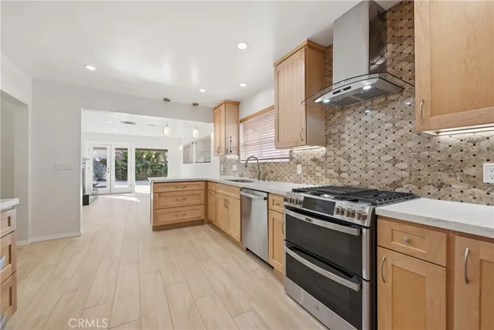 Kitchen has GE Profile appliances w/double oven
