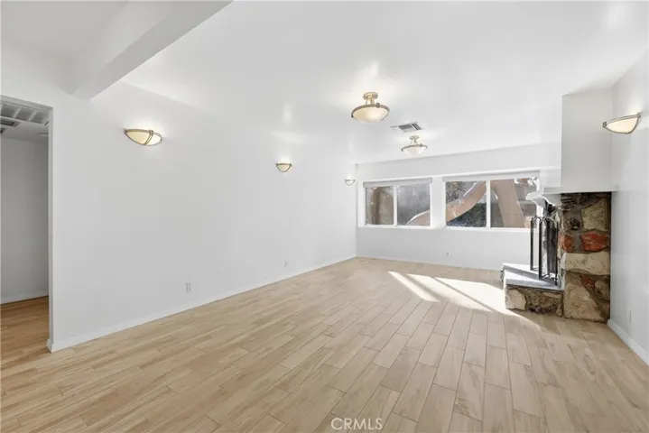 Oversized living room with fireplace