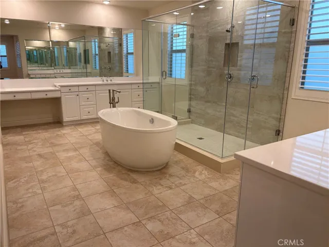master bath with his and her separate vanity